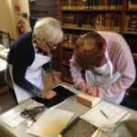 Showing a Library Friend how to maintain his book