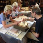 Showing a Library Friend how to maintain his book